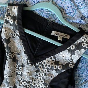 Little black sheath dress with lace inset